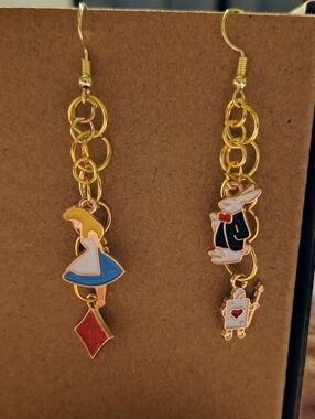 Gold Tone Alice in Wonderland Dangle Earrings with Blue and Red Enamel